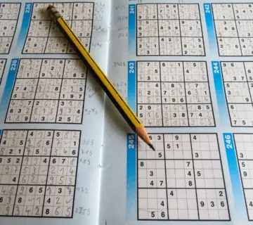 Område i krydsord løsninger